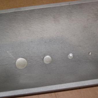 corrosion holes of different sizes